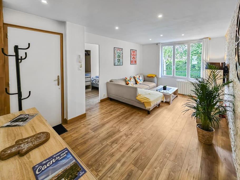 L'Escale Caennaise Apartment Bagian luar foto