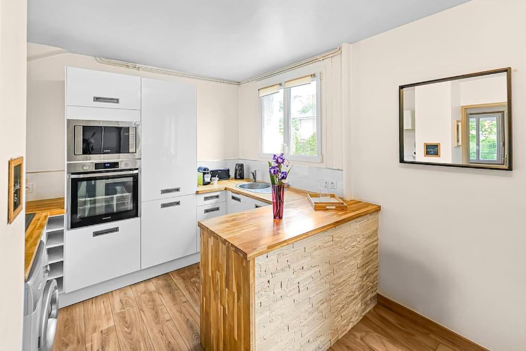 L'Escale Caennaise Apartment Bagian luar foto